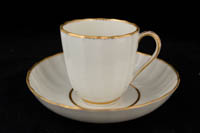 P148 - DERBY GILT WHITE CUP AND SAUCER