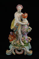 P001 - PAIR OF BOW FIGURES EMBLEMATIC OF FIRE AND WATER 