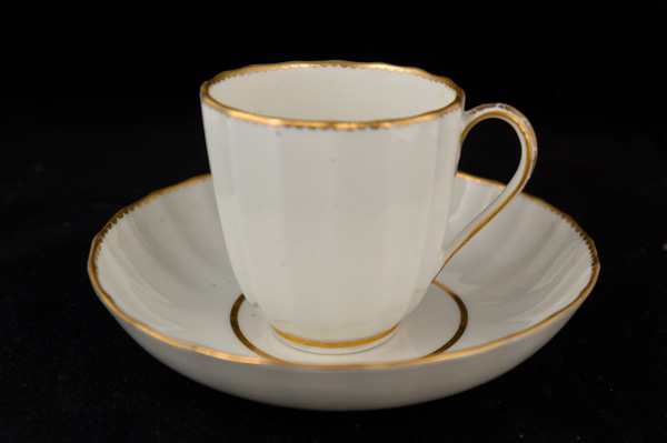 P148 - DERBY GILT WHITE CUP AND SAUCER