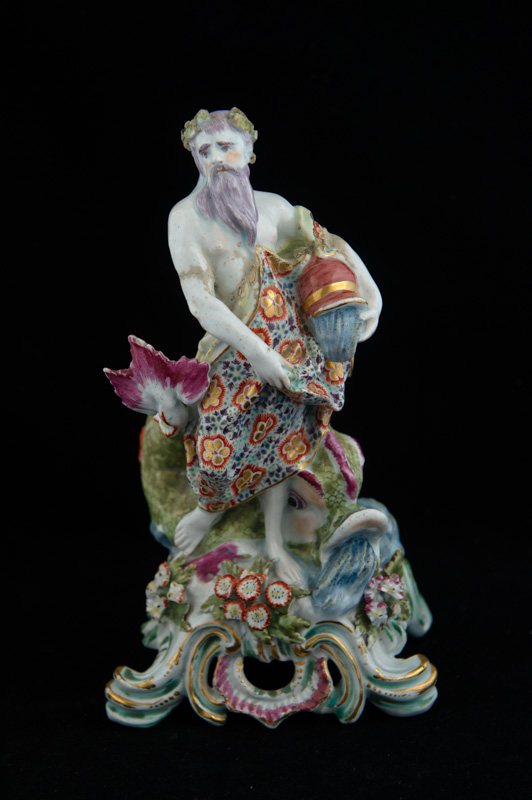 P001 - PAIR OF BOW FIGURES EMBLEMATIC OF FIRE AND WATER 